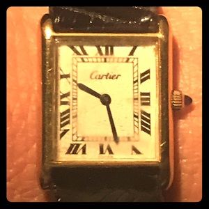 Cartier Tank watch.